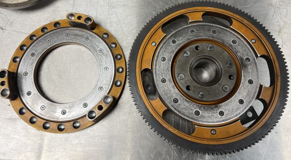 Kad A series flywheel and backplate